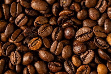 Fototapeta premium Close Up Macro Texture of Dark Roasted Coffee Beans Background