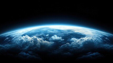 Fototapeta premium A stunning view of Earth from space, showcasing the curvature of the planet surrounded by wispy clouds set against a deep black background, ideal for themes of exploration, science