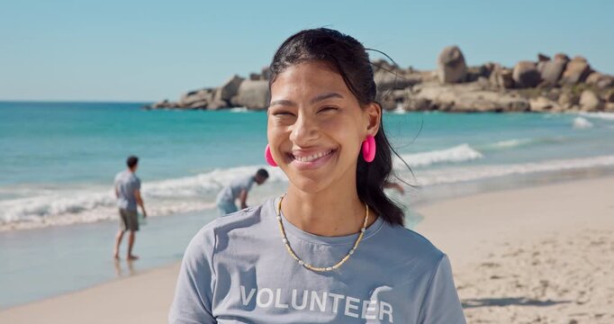 Happy, woman and face of volunteer on beach for recycling, community service or charity work. Smile, cleaning and portrait of female ngo employee by ocean for earth day with seaside conservation.