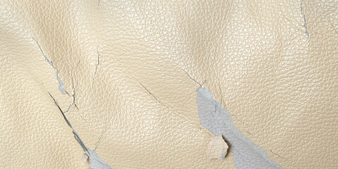 Faux leather peeling showing cracked worn texture