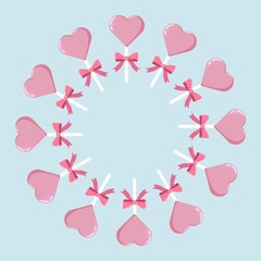 Circular wreath of pink heart-shaped lollipops with bows, evenly spaced on pastel blue background © Lipitorika