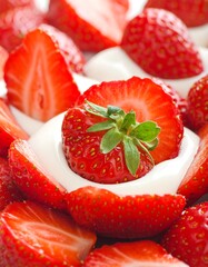 Fresh strawberries on white creamy yogurt