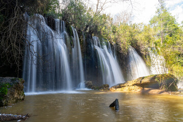 Naklejka premium Kurşunlu Waterfall Nature Park (Turkish: Kurşunlu Şelalesi) is located 19 km from Antalya, Turkey at the end of a 7 km road branching off to the north of the Antalya-Serik-Alanya highway