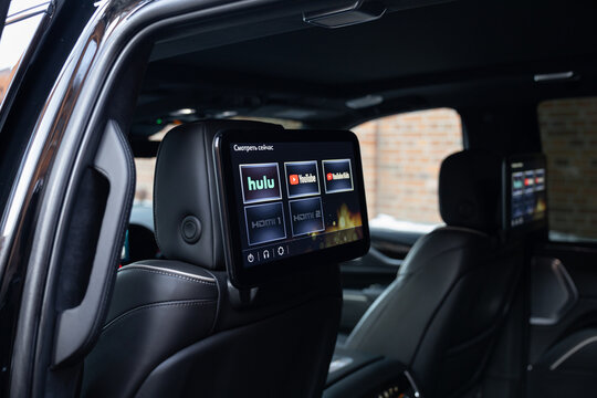 Black interior of the new Cadillac Escalade with premium leather, digital cockpit and luxury details. Modern full-size SUV cabin showcasing advanced technology and refined craftsmanship