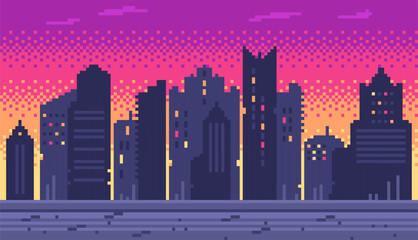 Pixel art city buildings against colorful sunset sky