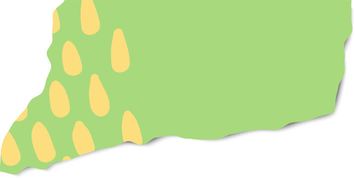 Torn green paper with yellow polka dot pattern