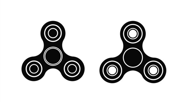 Two black fidget spinners displayed against a white background silhouette