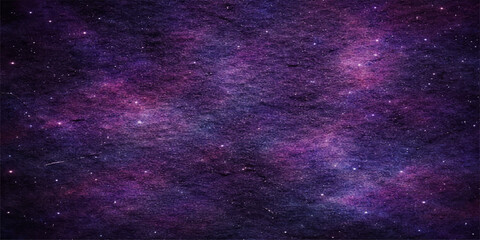 A deep cosmic nebula glows with ethereal light across a vast abstract space background featuring a starry field of blue planets and distant galaxies within the dark outer universe © hossain