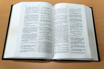 Arabic dictionary on a desk