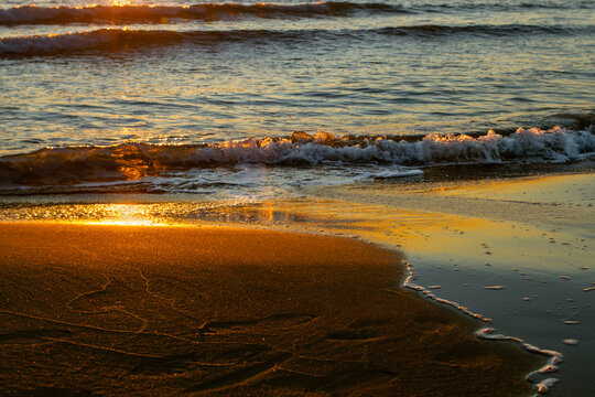 Sea view at sunset. Evening landscape. Beautiful seascape at sunset. Outdoor activities and travel. Suitable as a background.
Natural texture. Add text. Close-up. Graphic design.