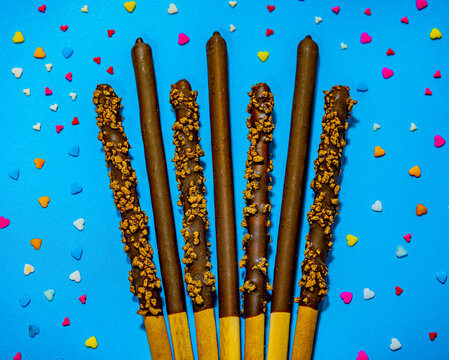 Dropped in chocolate a stick cookie Pepero. November 11th is Pepero Day in Korea