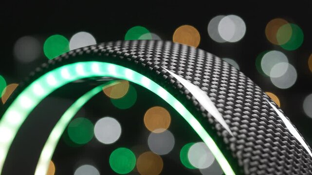 Macro Shot Of Carbon Fiber Component With Bright Led Light Strip