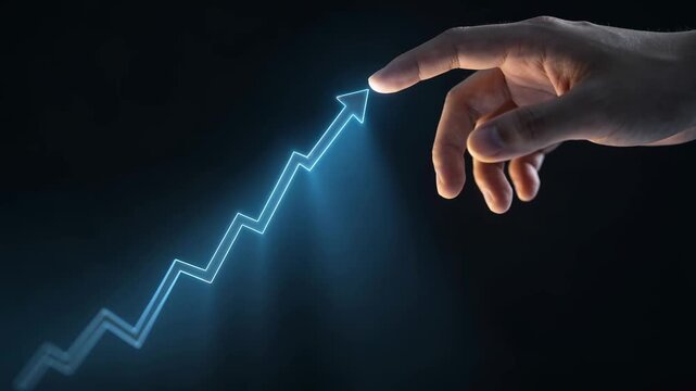 Disinflation trend - A hand reaching towards a glowing upward trending arrow symbolizing growth, success, and progress in a dark background.