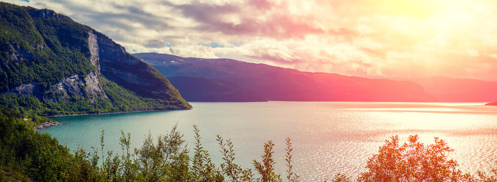 View at fjord at sunset light. Scandinavian landscape. Nature of Norway