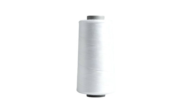 White thread spool, vertically oriented, against a black background