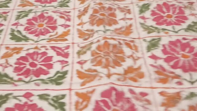 Floral block print fabric texture closeup vibrant colors, textured effect, rustic art, handmade, square patterns, detailed artistry, creative craft