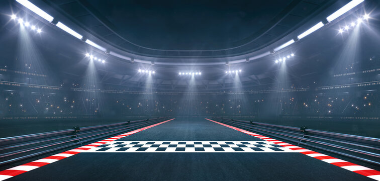 Finish line at a sports racing circuit in foggy weather with shining floodlights and fans ready for an upcoming nighttime sports event.