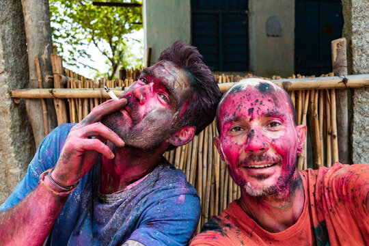 Free spirited travelers celebrating Holi together