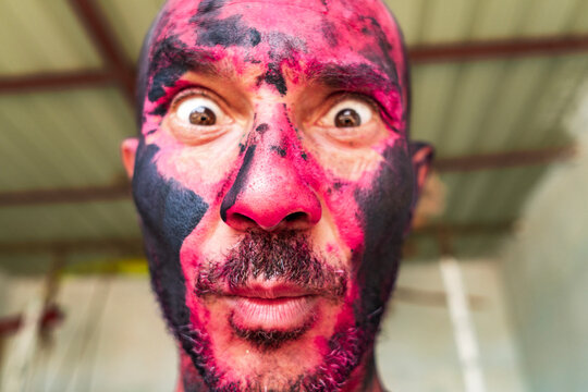 Raw emotional expression during Holi celebration