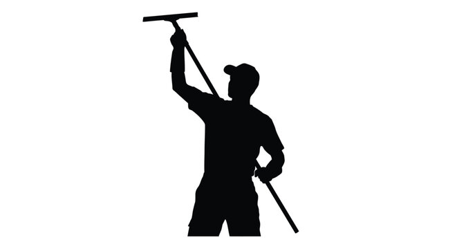 Silhouetted window cleaner reaching upwards with a squeegee and handle