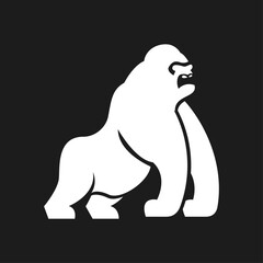 Obraz premium Powerful White Gorilla Silhouette Logo Design on Black Background