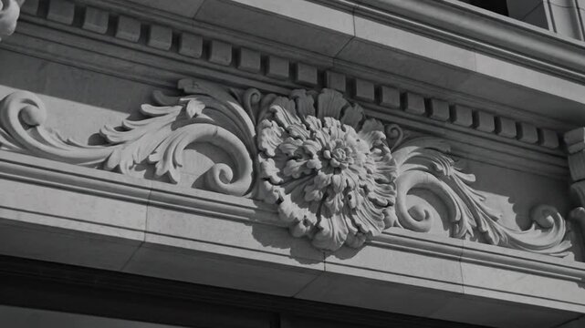 Intricate Stone Ornamentation on Historic Building Facade