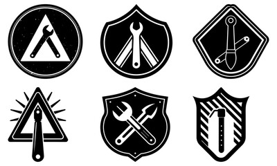 Collection of black and white emblems featuring tools and symbols on various shields and badges