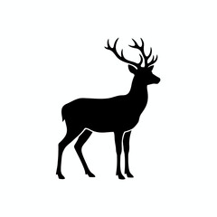 Obraz premium A solid black silhouette of a male deer with large antlers stands facing right against a white background.