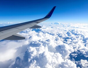 Airplane wing soars above fluffy clouds under a bright blue sky, offering a stunning aerial view