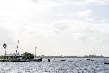 Colorful traditional boat moored beside Alcochete pier