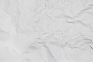 Obraz premium Sfondo di carta bianca stropicciata con texture rugosa e ombre profonde