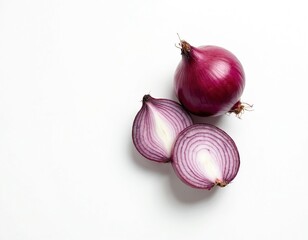 Whole red onion and one cut in half on white background. Close-up of purple vegetable layers showing fresh vibrant rings, healthy food ingredient for cooking.
