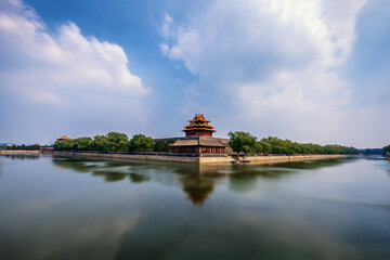 Naklejka premium Forbidden City Corner Tower, Beijing - Imperial Architecture Over Water