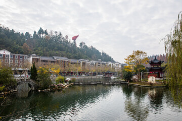Fototapeta premium Jinggang Mountain Lake Town with Traditional Chinese Pagoda and Architecture