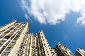 Modern Residential Apartment Buildings Elevation Shot Against Blue Sky © TaVan