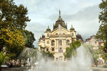 Kosice National Theater in baroque style with Singing Fountain on foreground, Main street, Kosice Old Town, Slovakia 