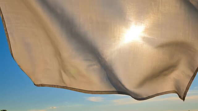 White Fabric Flapping in the Wind