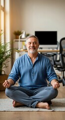 Fototapeta premium Mature Caucasian man meditating in home office for mindful stress relief and mental health