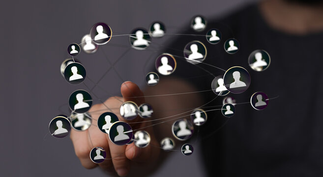 Hand interacting with digital network of people. Communication and technology concept. Abstract of connecting individua