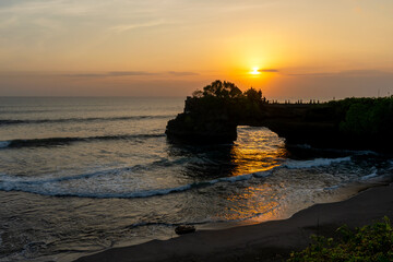 Sunset at Batu Bolong temple in Tanah Lot Bali Indonesia © cn0ra
