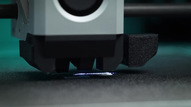 3D Printer Performing Precise Laser Scanning Of The First Layer Of 3D Print Filament and Calibrating the Flow in Macro