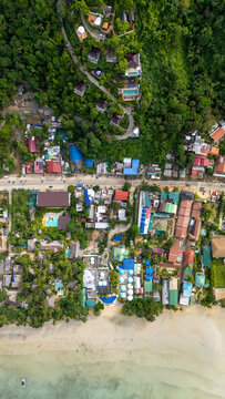 Drone aerial view of Karuna villas on the mountain near Corong Corong next to El Nido, The Philippines.