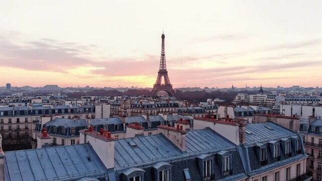 Eiffel Tower and Paris Rooftops at Sunset with Beautiful Sky.