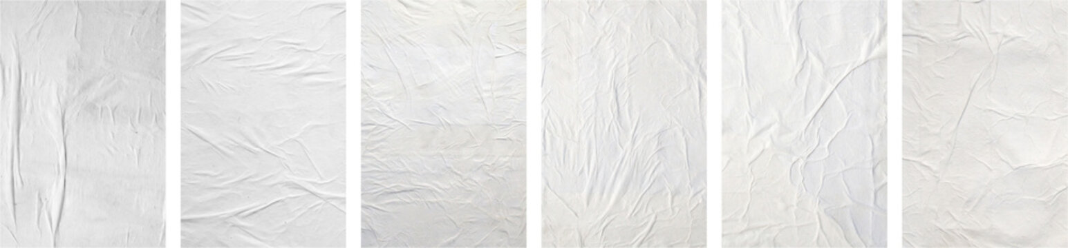 white crumpled and creased glued mockup paper poster template set isolated on black background
