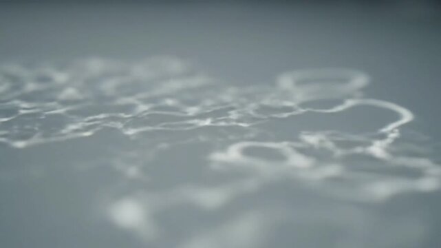 Abstract Shallow Dof Close-up shallow dof abstract showing caustic patterns; subtle movement; safe content; no faces; no trademarks scene 3 Abstract cinematic angle