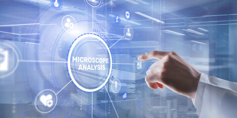Fototapeta premium Scientist conducting precise microscope analysis in a modern research laboratory