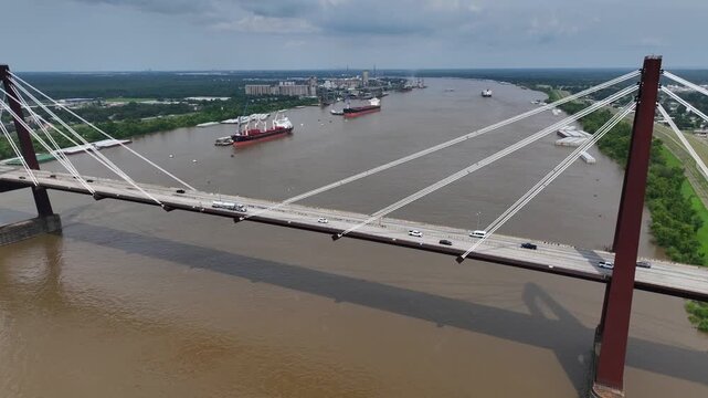 Cars traveling on Hale Boggs Memorial Bridge, a cable-stayed bridge over the Mississippi River in St. Charles Parish in Louisiana