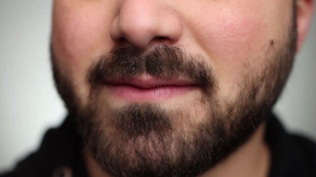 Close up of a man with dimples smiling. Man smiling. Dimple