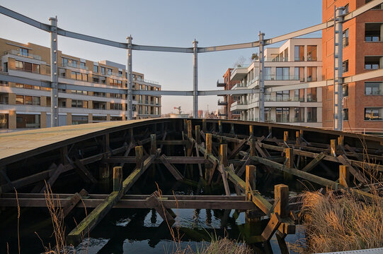 Detail of the wooden structure supporting an old gas tank. Restored industrial heritage on Tondelier site, Ghent, Flanders, Belgium 