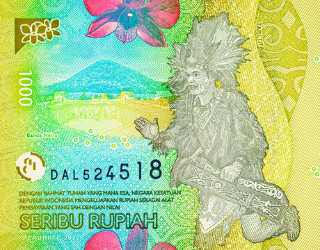 1000 Rupiah Indonesia with the image of the Tari Tifa dance and a traditional instrument.. Paper money of Indonesia.